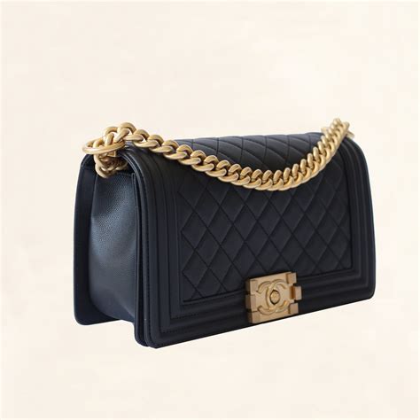 chanel boy black gold|Chanel boy bag gold chain.